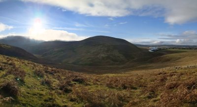 Panoramic view of hill, valley and reservoir