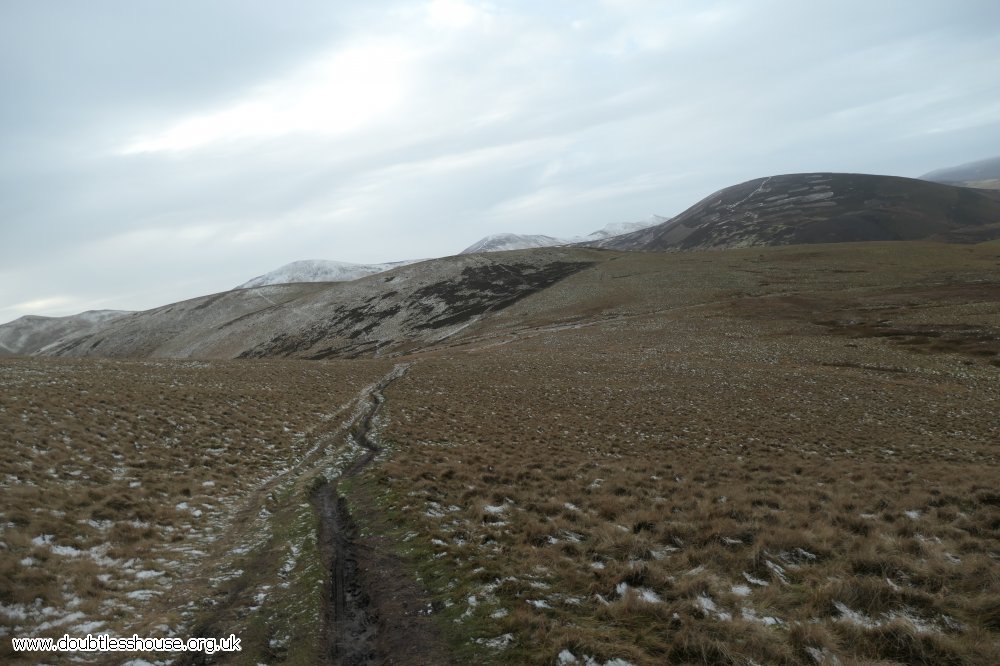 Quad track in Pentland Hills, track on open hillside, looking West