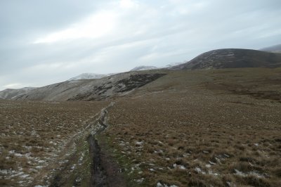 Quad track in Pentland Hills, track on open hillside, looking West